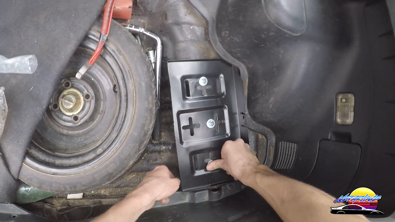 Mounting the battery tray for your car battery relocation